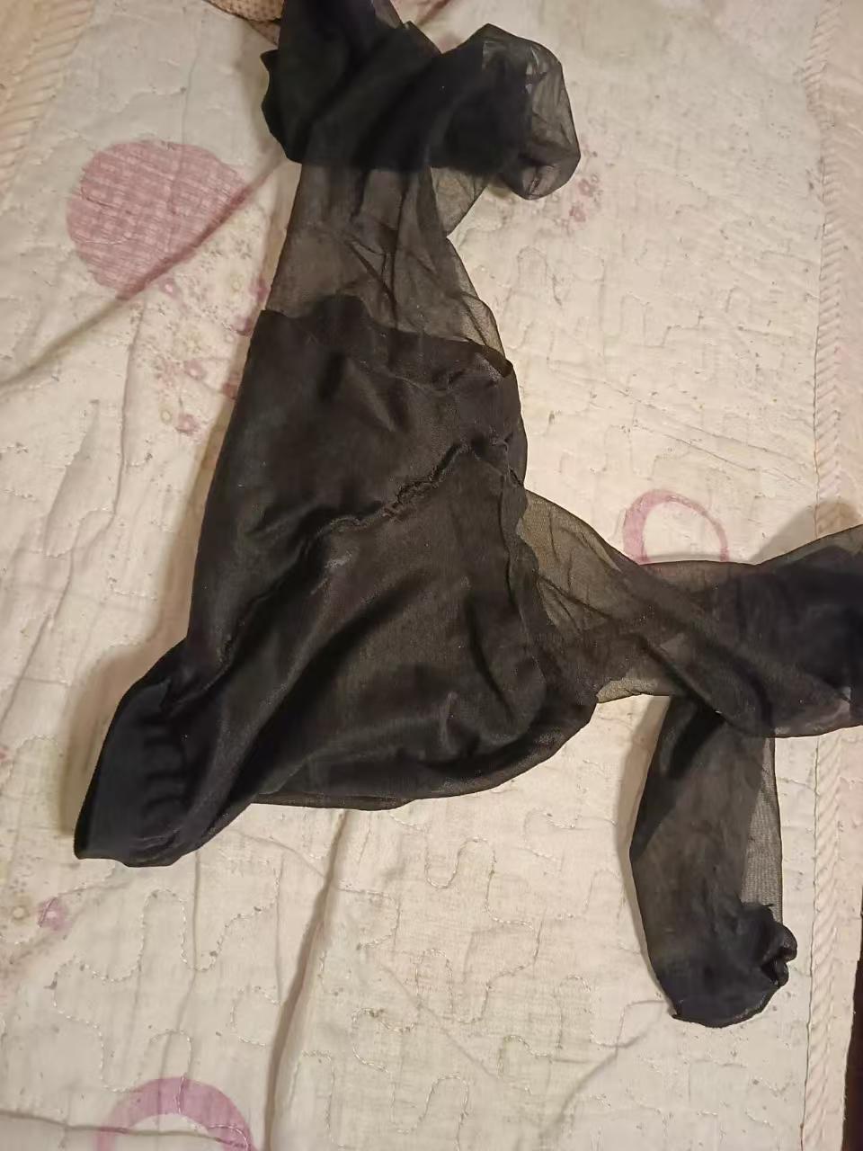 Authentic pre-owned black hosiery from Ebby models — Intense scent profile.
