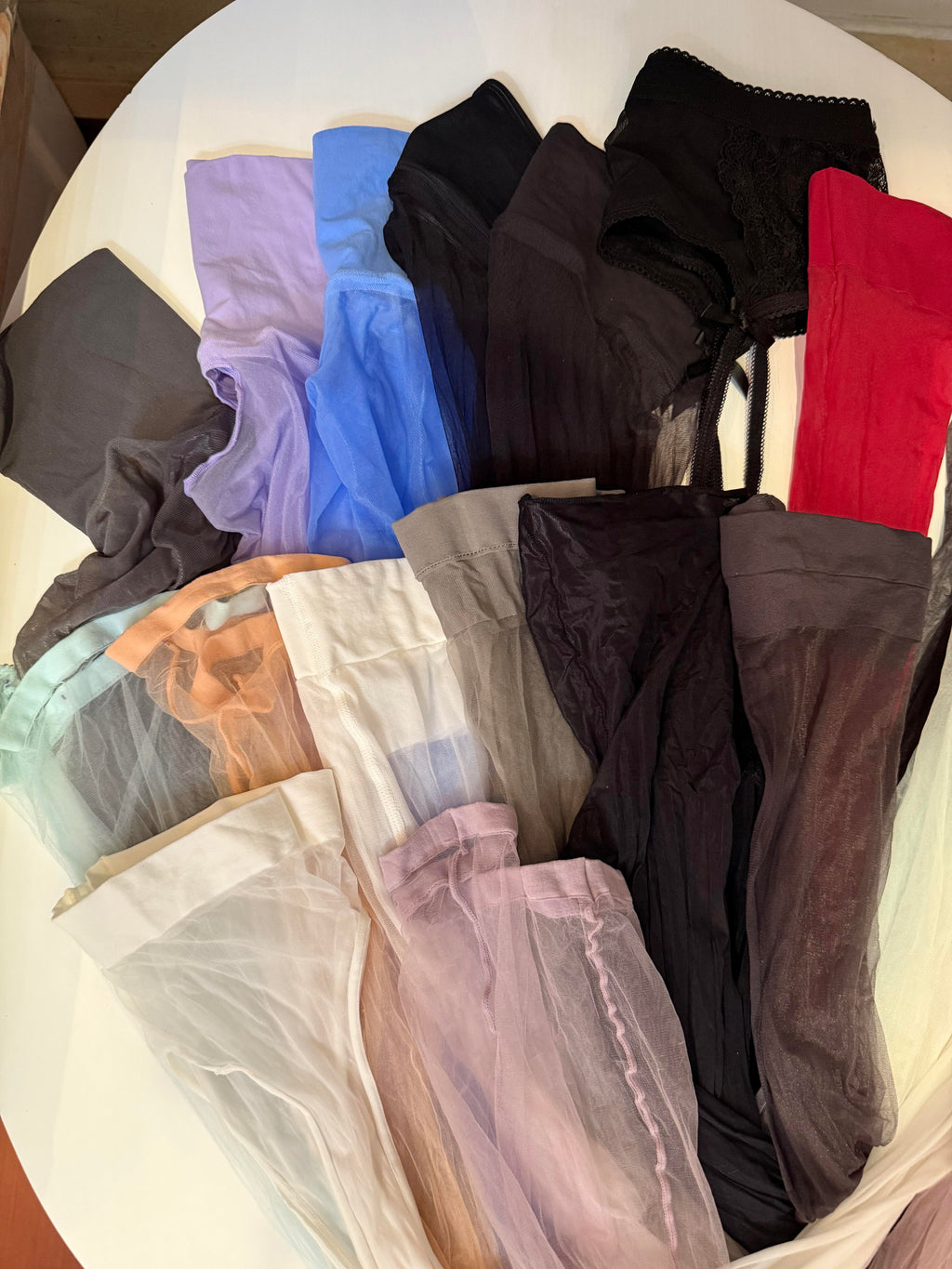 Archived and well-loved hosiery gallery. Available in black, nude, sheer tights, and fantasy styles. Experience the ultimate soft texture, comforting warmth, and personal signature of pristine, unwashed pieces.